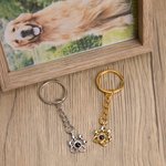 Llavero personalizado con foto de proyección de la huella de la pata de la mascota