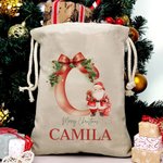 Saco de regalo personalizado con las iniciales de Papá Noel y el nombre de la familia para la fiesta de Navidad