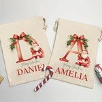 Saco de regalo personalizado con las iniciales de Papá Noel y el nombre de la familia para la fiesta de Navidad