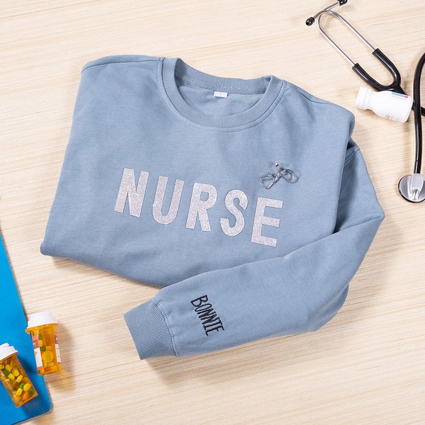 Personalised Glitter Nurse Pattern Sweatshirt with Embroidered Name and Stethoscope Brooch Nurse Graduation Birthday Gift for Nurse