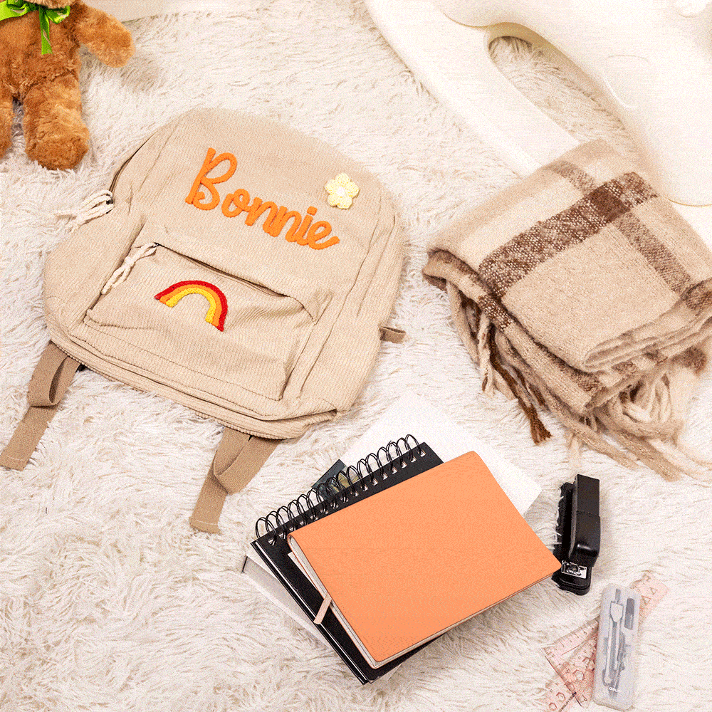 Zainetto personalizzato in velluto a coste con fiore intrecciato arcobaleno e nome ideale per asilo o scuola materna regalo per bambini