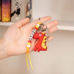Llavero personalizado con nombre de dinosaurio de dibujos animados de colores Accesorios para mochilas Cumpleaños Vuelta al cole para niños Niñas