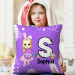 Cojín de Pascua personalizado con el nombre del niño, la niña y el huevo de Pascua de dibujos animados.