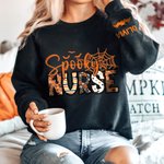 Personalized Spooky Nurse Bat Spider Web T-shirt Sweatshirt with Name Multicolor Halloween Costume Holiday Gift for Nurse Doctor Medical Staff