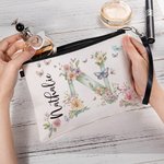 Personalizzato acquerello iniziale floreale Borsa trucco portatile con nome e cinturino da polso Accessori da viaggio portatile Compleanno damigella d'onore regalo per le donne