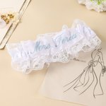 Henkilökohtainen monivärinen kirjailtu pitsinen keula häät sukkanauha tekstillä häät Bridal Shower lahja morsiamelle