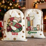 Sacco di tela personalizzato con iniziale e nome design natalizio fiocco di neve bomboniere per vigilia di Natale regalo per bambini