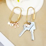 Gepersonaliseerde engel vleugel boog bloem hart charme met initiaal tas sleutel accessoire kerst verjaardag cadeau voor vriend familie