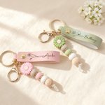 Personalised Birth Flower PU Leather Keychain with Engraved Name and Sunflower Bead Pendant Wedding Party Birthday Gift for Bridesmaids Friends