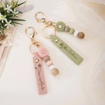 Portachiavi personalizzato in pelle PU con nome inciso e ciondolo a forma di margherita regalo di compleanno per damigelle e amiche