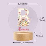 Veilleuse LED en acrylique avec nom et socle en bois personnalisée Lapin floral initial Décoration de la chambre d'enfant Cadeau d'anniversaire de Pâques pour les enfants