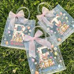 Bolsa transparente personalizada con nombre e inicial diseño de pascua con lazo rosa conejo y pollitos regalo de fiesta para niños