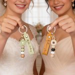 Personalized Birth Flower PU Leather Keychain with Engraved Name and Daisy Bead Pendant Wedding Party Birthday Gift for Bridesmaids Friends